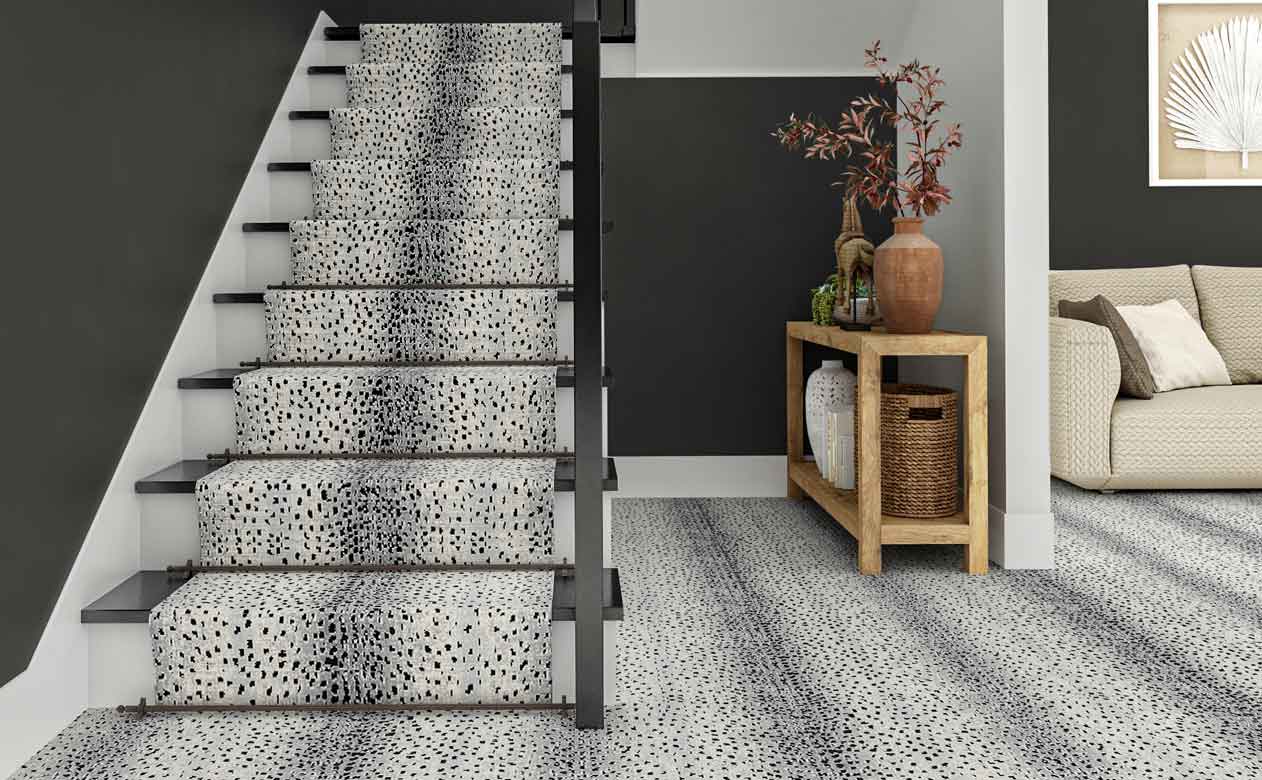 Stair case with an animal printed stair runner